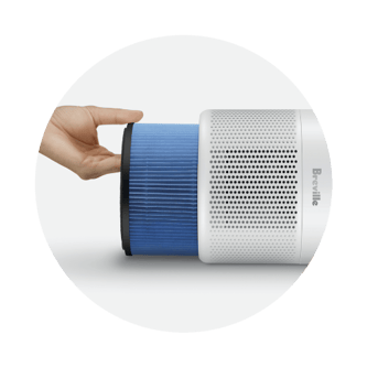 A person replacing the antiviral HEPA-13 filter