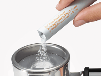 Cleaning sachets behing a espresso machine