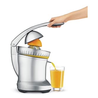 Juice pouring out the spout in a steady non splash stream.
