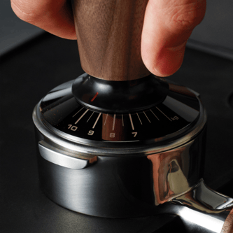 Close up of the tamp in the portafilter