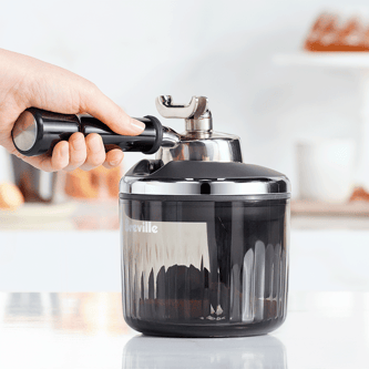 The 58mm portafilter fits upside down onto the head of the puck sucker