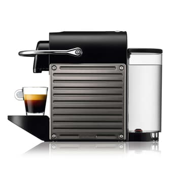 28 oz removeable water tank located at the back of the Pixie Nespresso machine.