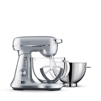 Front view of the Bakery Chef, its glass mixing bowl and the extra stainless steel mixing bowl.