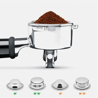 A portafilter with coffee grinds
