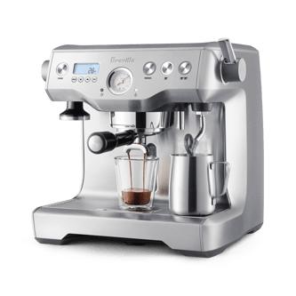the Dual Boiler™ profile right angle with milk jug and latte cup