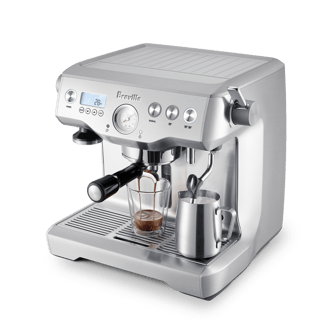 the Dual Boiler™ right angle high with milk jug and latte cup