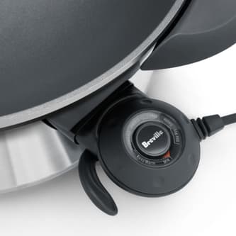 Close up of the control knob that demonstrates fifteen heat settings.