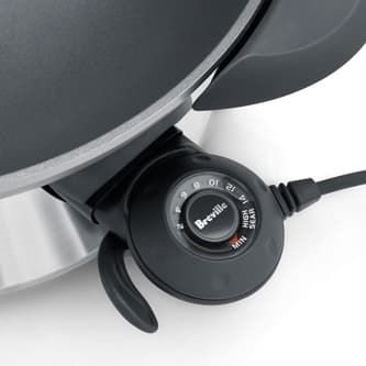 Close up of the control knob that demonstrates fifteen heat settings.