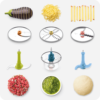 Sliced veggies, the paradice 16 attachments, a beef patty, green pesto dip, and a dough ball