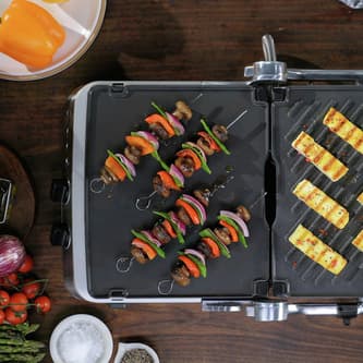 Skewers being cooked.