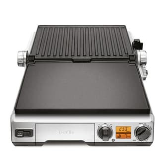 A demonstration of the grill plates laying flat at the full 180 degree capability.