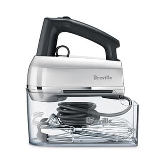 The Handy Mix Scraper with all its parts packed into the storage compartment.