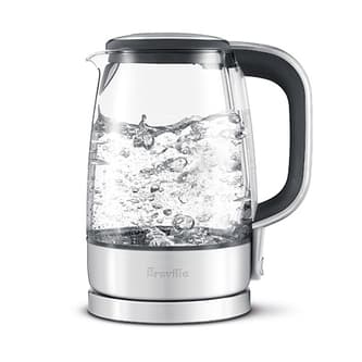 Boiling water in clear kettle.