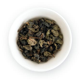 Bowl of tea leaves to be prepared to make tea using customized setting.