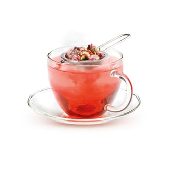 Cup of tea prepared by previously boiled water from the kettle.