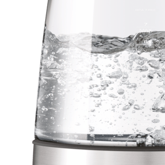 Close up of boiling water through the glass