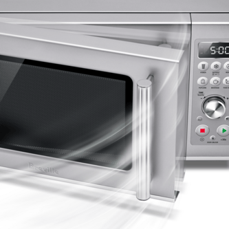 Front view of microwave door opening softly.