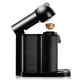 Front view of machine with cup of coffee.