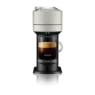 Front view of machine with black coffee, takes up less bench space