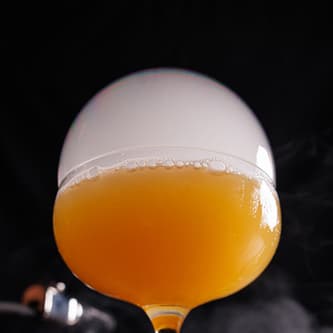 Bubble on top of a glass