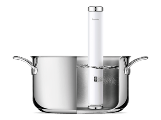 The Joule Turbo Sous Vide inside a pan filled up with water