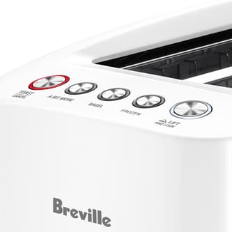 Angled partial view of toaster displaying buttons.