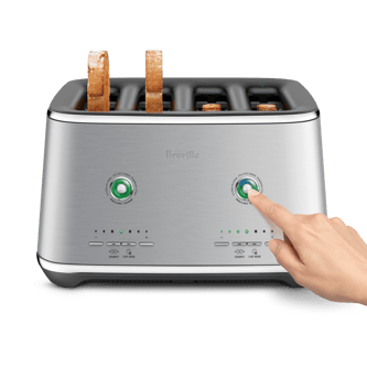 A hand reached out to press a button of the Eye Q™ Auto 4 Slice