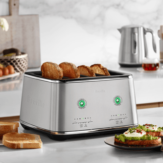 Lifestyle image of the Eye Q™ Auto 4 Slice in colour Brushed Stainless Steel