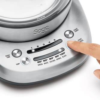 the Sage Smart Tea Infuser® Kettle & Tea in Brushed Stainless Steel with Glass Kettle treat tea right