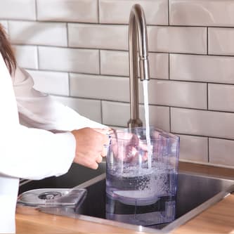 Container filling up with tap water