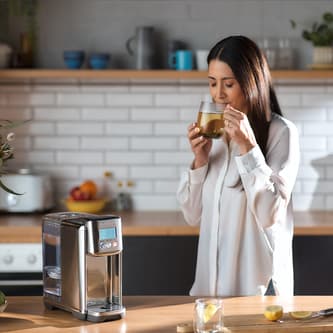 Woman drinking hot tea