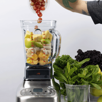 Grapes being tossed into the Super Q™ Pro