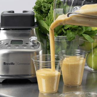 Juice prepared on the Super Q™ Pro poured into glass