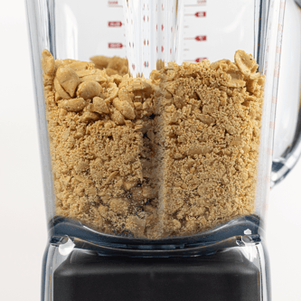 Close-up of nuts being crushed inside the Super Q™ Pro