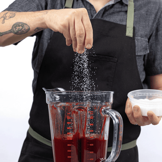 Condiment being poured inside the Super Q™ Pro