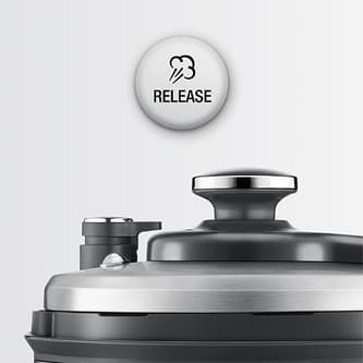 Press the release button to release pressure and steam.
