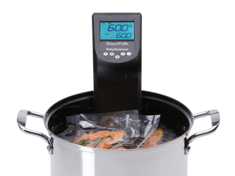 The sous vide device is clamped onto a pot filled with water and vacuum sealed salmon.