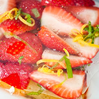A close-up of fresh, cut strawberries.