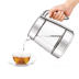 The smart crystal luxe kettle being poured into cup with tea
