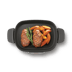 Overhead view of cooker with beef and potato wedges