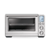 The Smart Oven Air Fryer XL with a roast chicken