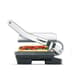 Side-on view of the grill with a panini inside.