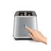 A hand reached out to press a button of the Eye Q™ Auto 2 Slice
