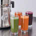 Different colour juices served in tall glasses